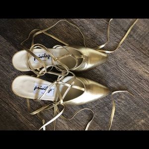 Gold leather slip on closed toe heels